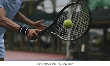 tennis-player-swings-racket-toward-260nw-2710023839