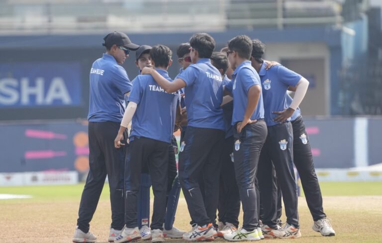 OCA Women Blue team celebrates fall of wicket.JPG