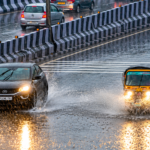 Monsoon-Traffic-on-a-Reflective-Overpass-1